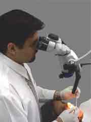 Dr. Awab Alvi using the Microscope